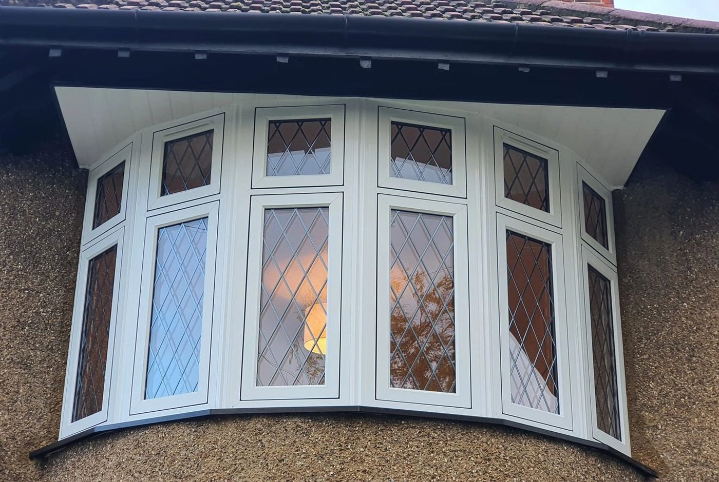 White bay window exterior fitted by Precision Fit