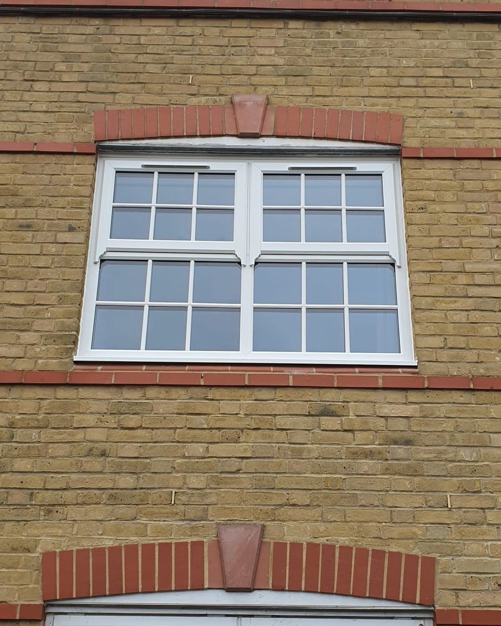 Replacement Georgian-style white windows fitted by Precision Fit